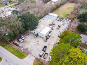 Drone photo of industrial building on long, rectangular tract
