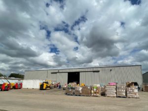 warehouse with dramatic cloudy sky