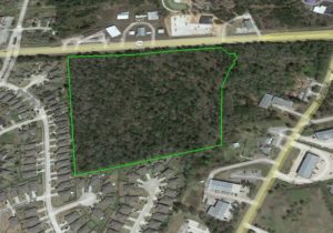 Aerial image of larger tract near residential homes