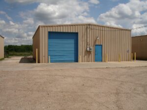 Small metal warehouse at 20023 County Rd 143, Alvin, TX 