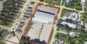 Aerial image of industrial building with yard