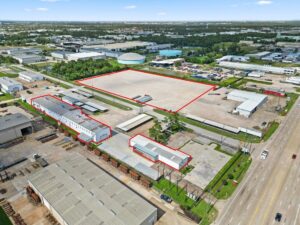 Drone photo of industrial property with land available 