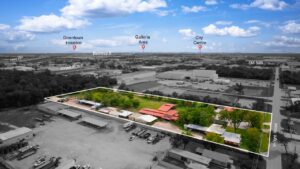Drone photo displaying several buildings on a five-acre tract